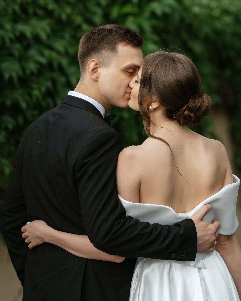 young-couple-bride-and-groom-in-a-white-short-dress-19.jpg