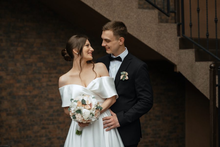 young-couple-bride-and-groom-in-a-white-short-dress-28.jpg